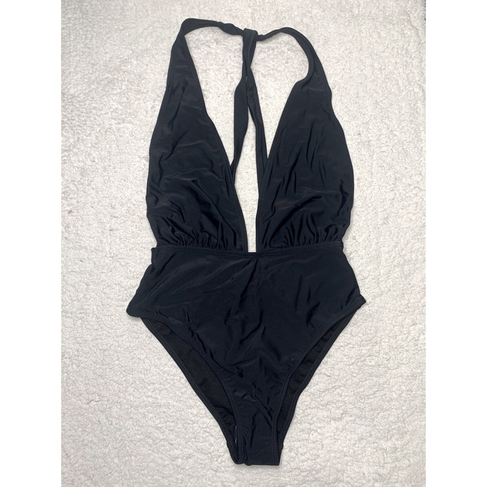 Revamped black low cut one piece swimsuit